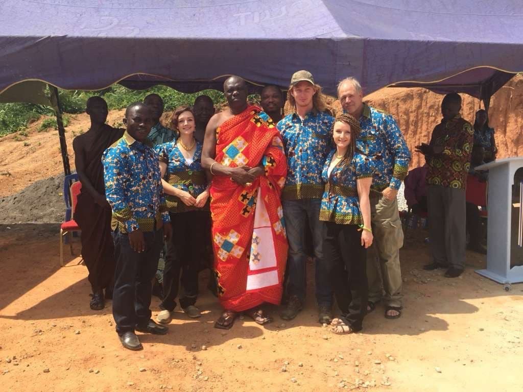 Group standing with the chief, Mike and Pastor John